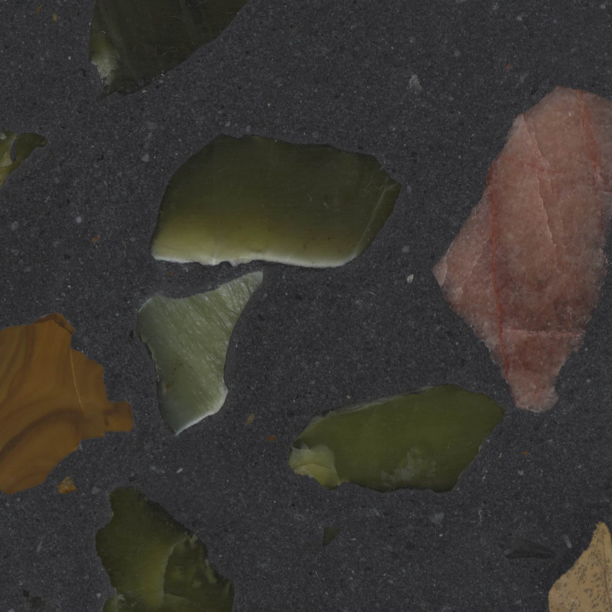 Downloadable high-resolution dark terrazzo style image, close-up detail of its green, pink, and amber stone chips within a charcoal grey matrix, for digital printing systems.