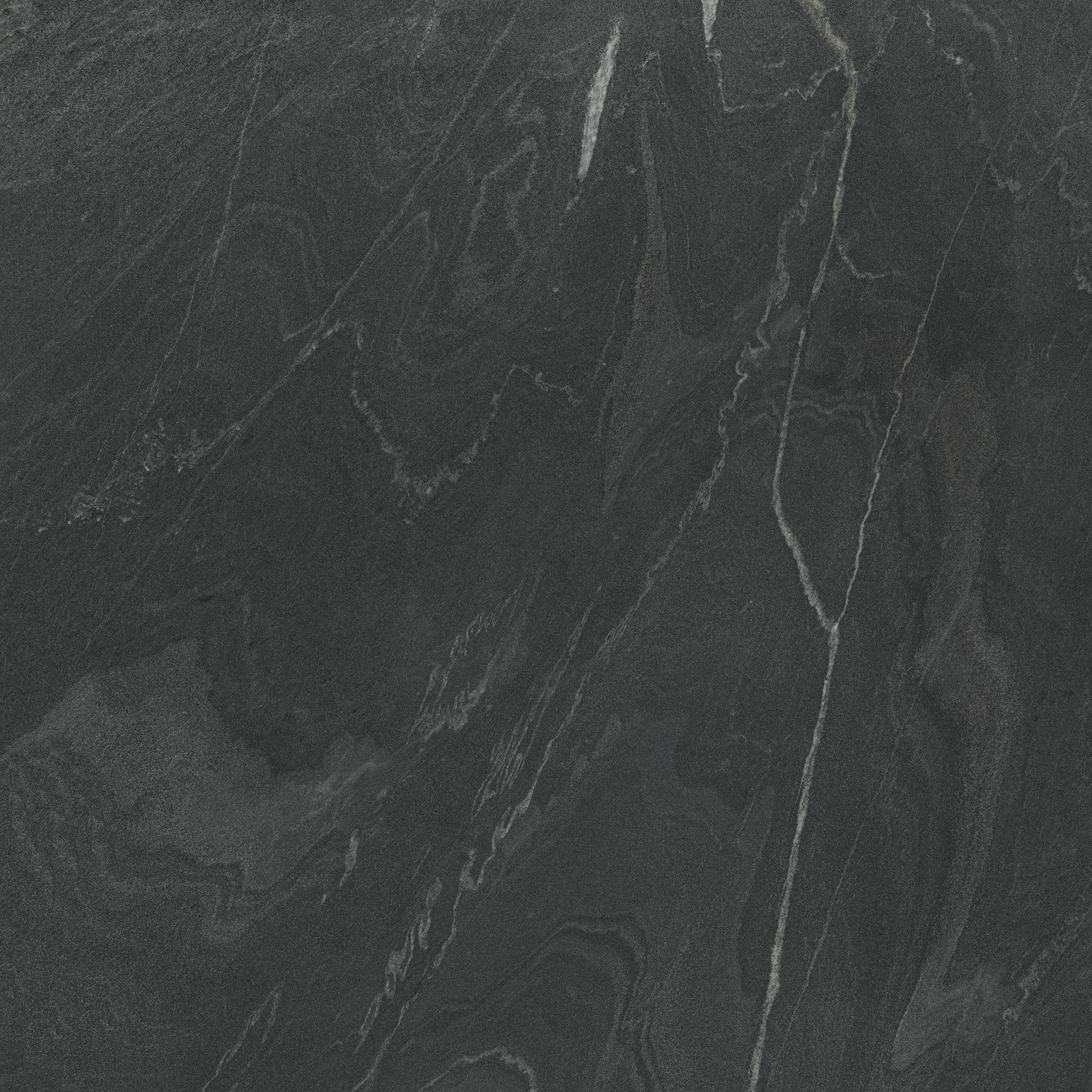 Downloadable high-resolution dark grey stone texture set, displaying various views of its layered patterns and fine granular surface, for digital printing systems.