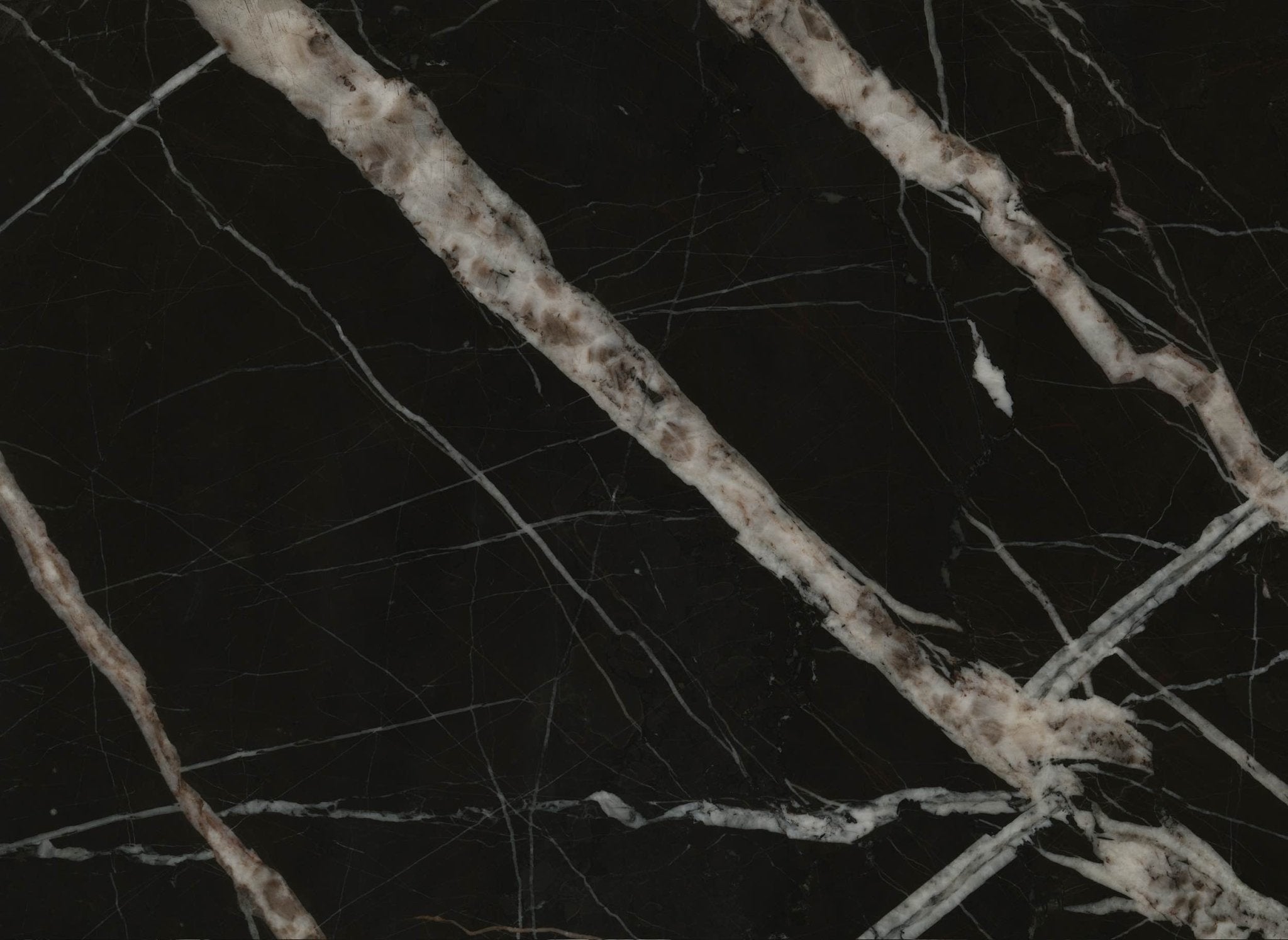 Downloadable high-resolution black marble texture set, displaying various views of its deep dark surface with striking white veining, for digital printing systems.