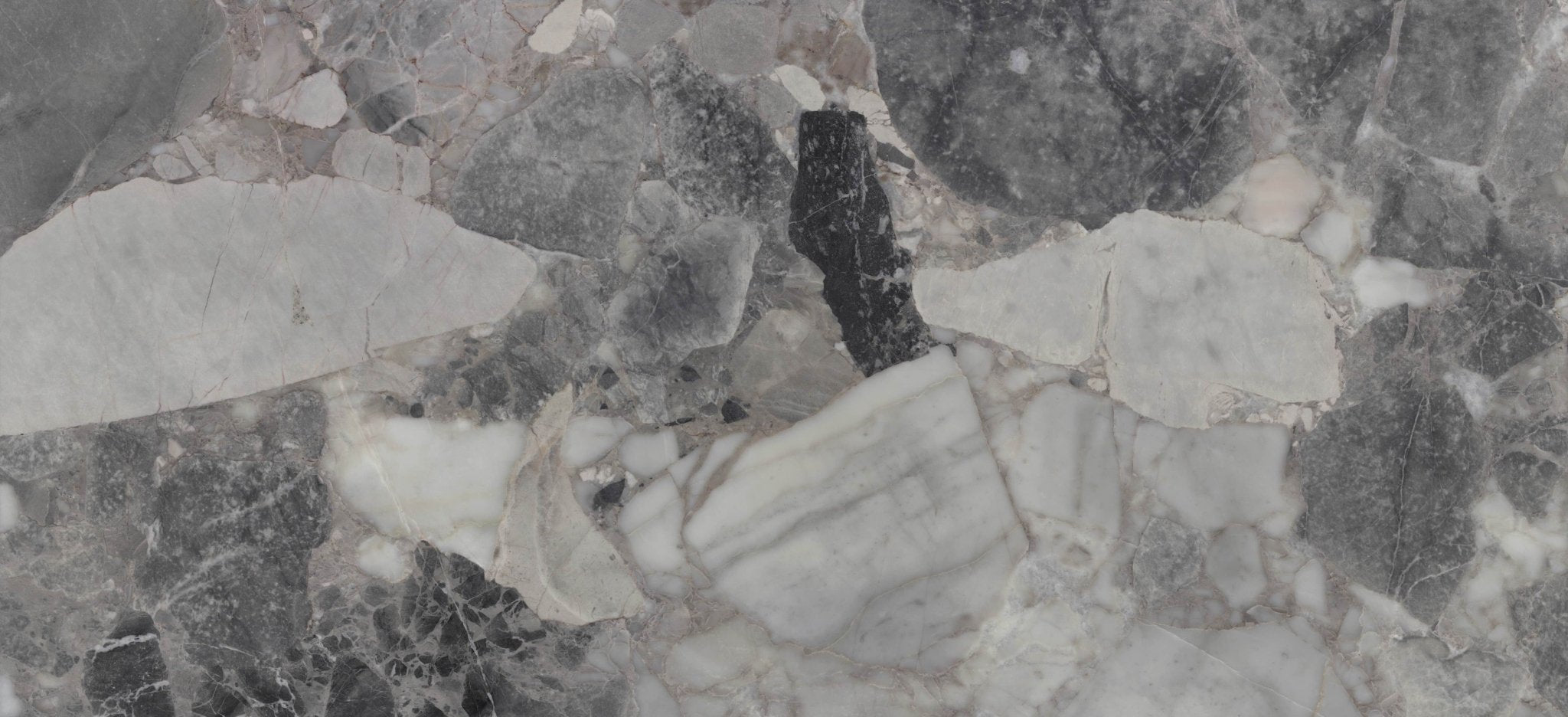 Downloadable high-resolution brecciated marble texture set, displaying various views of its grey and white fragmented patterns, for digital printing systems.