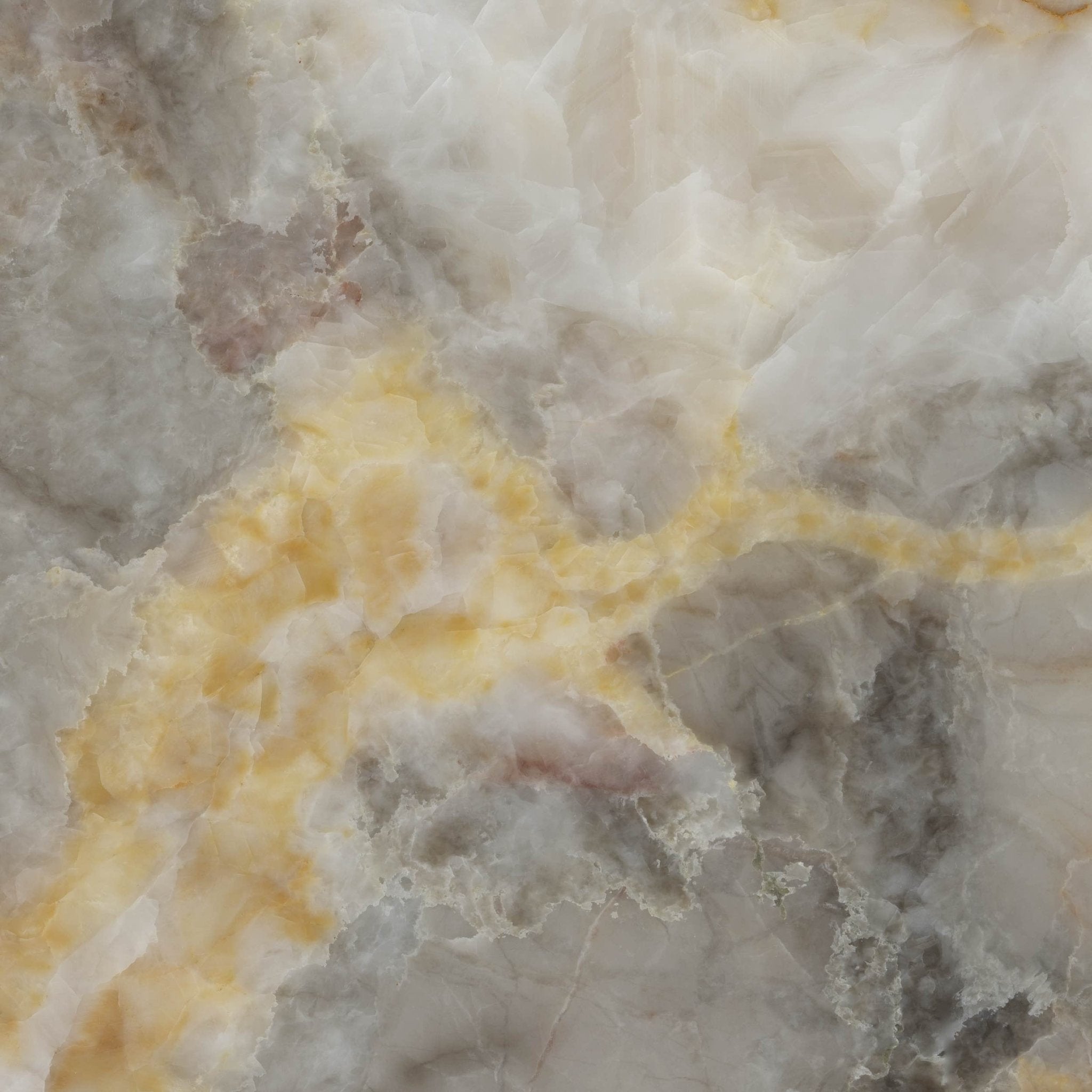 Downloadable high-resolution marble image, close-up detail of its striking crystalline white and golden-yellow veining on a grey background, for digital printing systems.