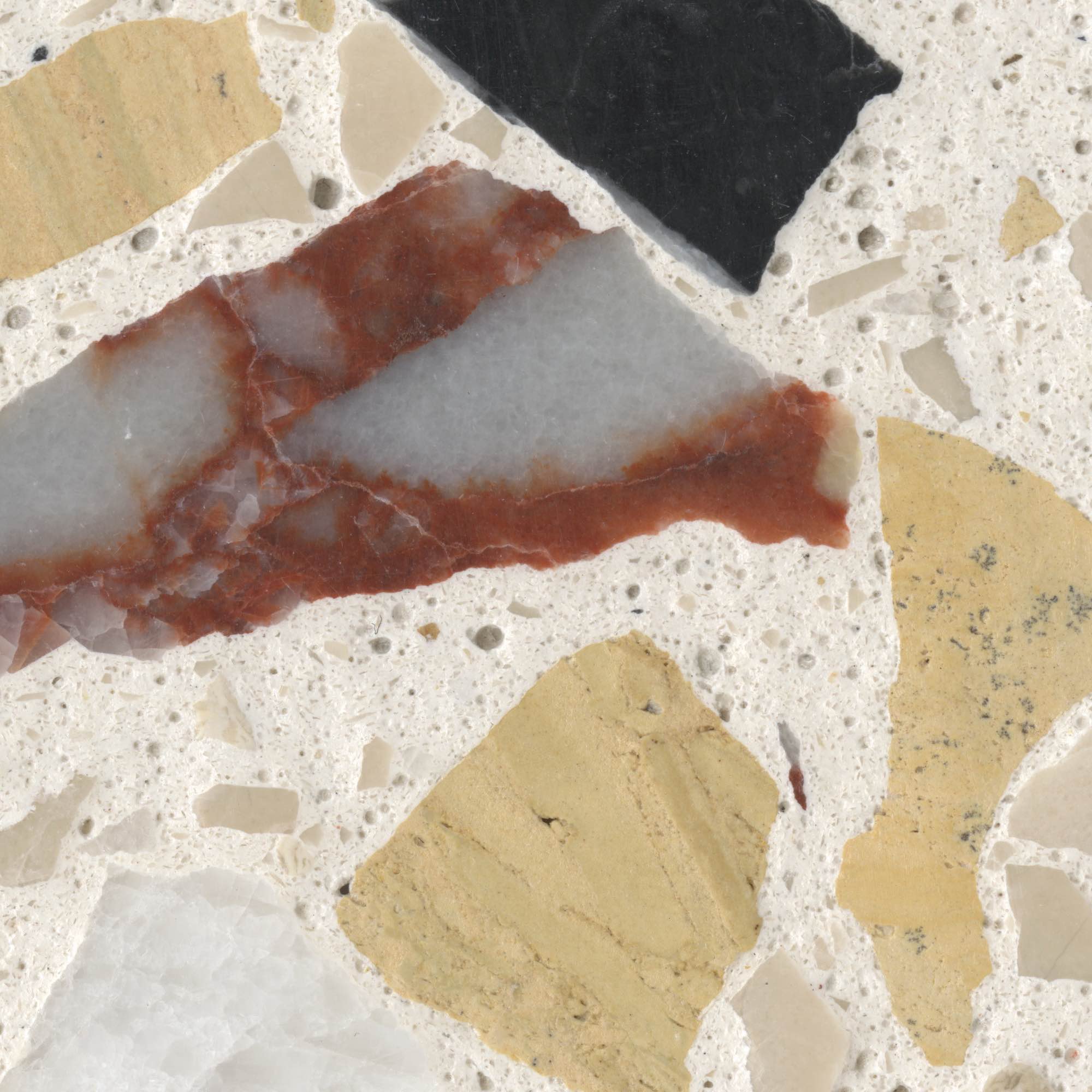 Downloadable high-resolution terrazzo style image, close-up detail of its diverse multi-colored stone fragments with varied textures set in a light matrix, for digital printing systems.